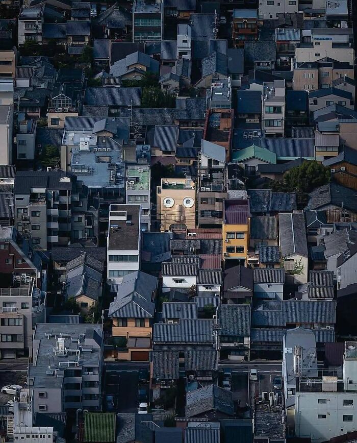 Brilliant designs of a building with large eyes, standing out among the beautiful designs of other buildings, highlighting career.