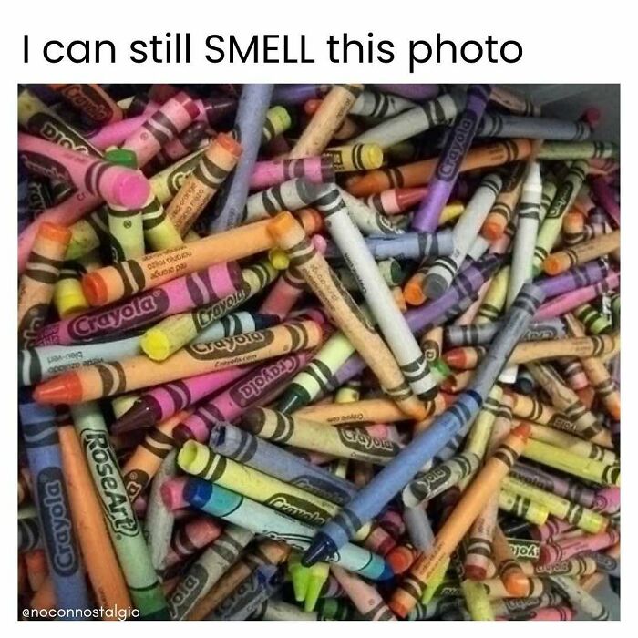A pile of colorful used Crayola crayons, evoking the magic of the 90s and 00s.