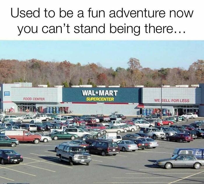 A vintage Wal-Mart Supercenter full of cars, evoking Saturday mornings and pure nostalgia.
