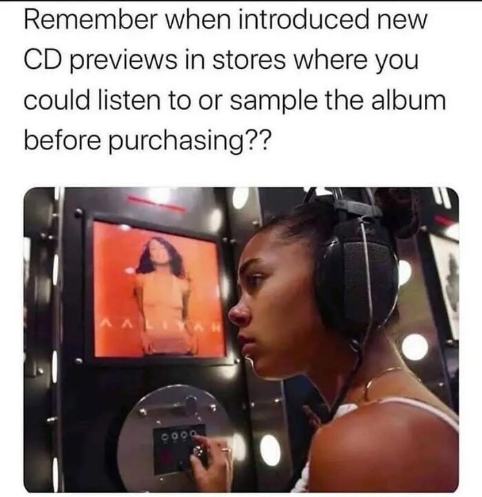 A person listening to a CD preview in a store, a classic pure nostalgia gem from Saturday mornings.
