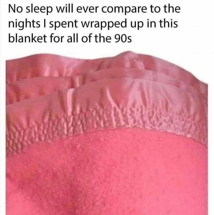 A close-up of a pink, textured blanket, a pure nostalgia gem representing cozy Saturday mornings.