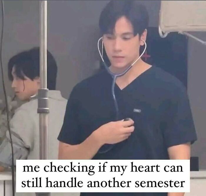 Funny medical meme of a man in scrubs with a stethoscope, checking his heart to see if he can handle another semester.