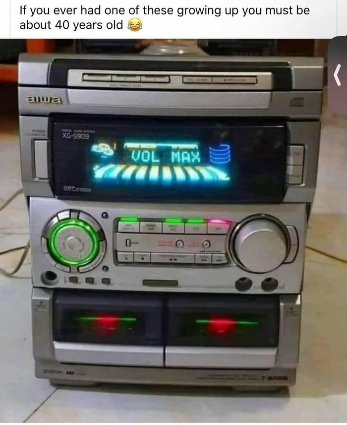 A vintage AIWA stereo system with VOL MAX displayed, a true nostalgia gem from Saturday mornings.