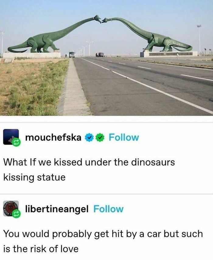 A funny Tumblr post showing a highway with two large dinosaur statues with their heads touching.