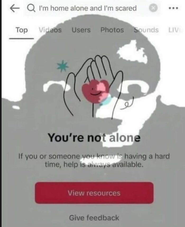 An internet search for I'm home alone and I'm scared, showing a mental health message You're not alone, an unhinged meme.