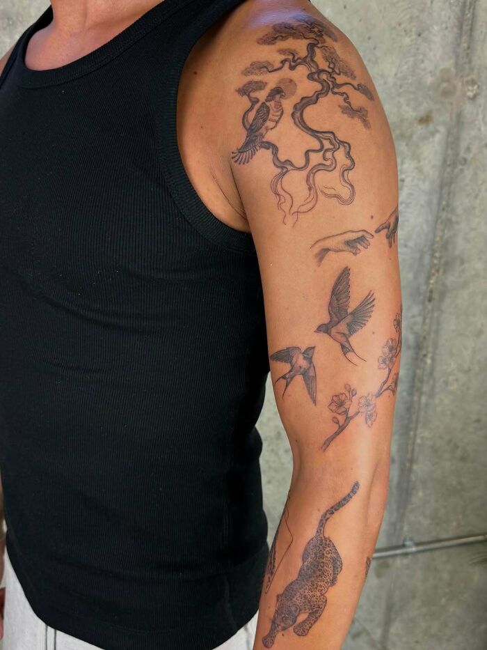 Nature-inspired arm tattoo ideas for women, with various animal and plant motifs, including birds, trees, and a leopard.