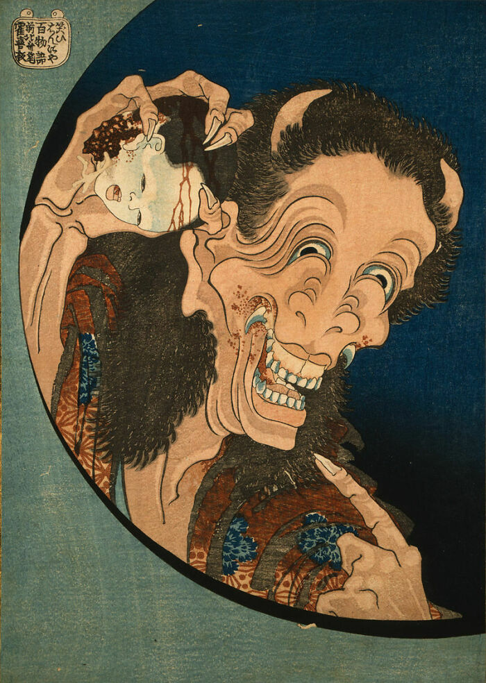 A Japanese woodblock print of a monster holding a severed head. This is one of the hidden gems by famous artists.