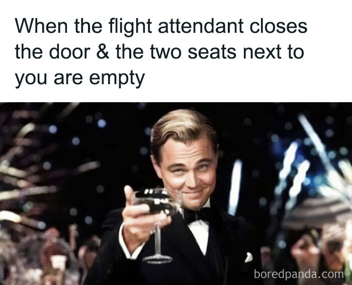 A travel meme with Leonardo DiCaprio raising a glass, celebrating empty seats on a plane, showcasing travel memes.