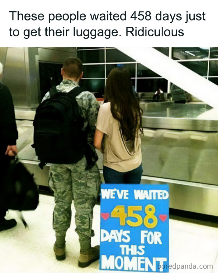 A travel meme of a couple at an airport, holding a sign that reads: We've waited 458 days for this moment.
