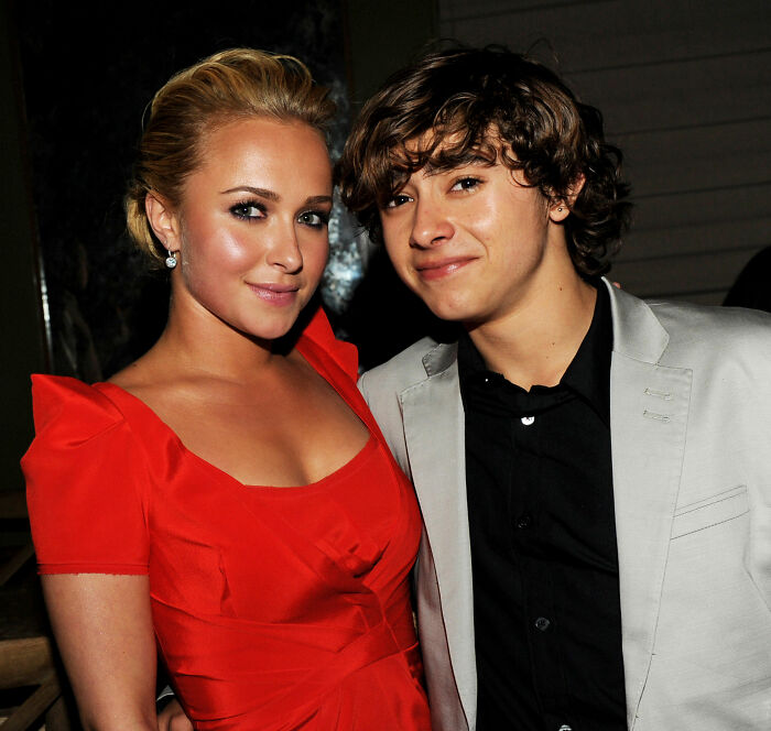 Hayden Panettiere and a young man smiling for a photo. Her childhood history resurfaces after her sudden passing.