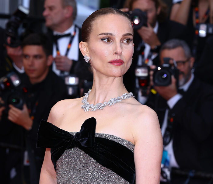 Natalie Portman on a red carpet, embodying her reputation as a diva and actress.