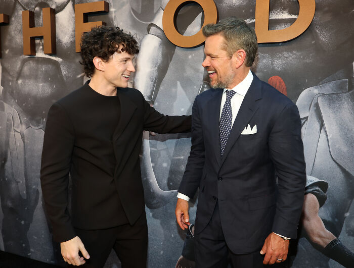 Matt Damon and Tom Holland sharing a laugh, highlighting their interaction as great actors. Matt Damon and Tom Holland sharing a laugh, highlighting their interaction as great actors.