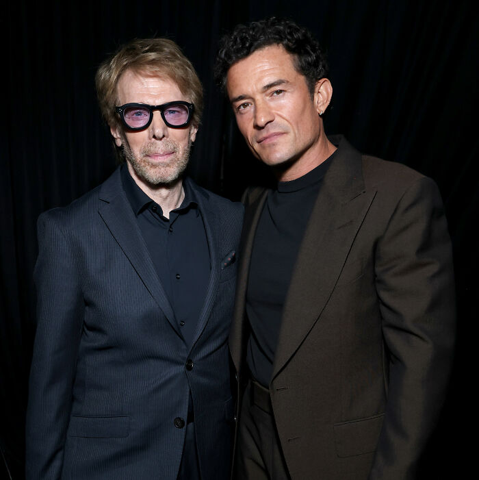 Jerry Bruckheimer and Orlando Bloom, relevant figures in the blockbuster franchise amidst Margot Robbie casting rumors. Jerry Bruckheimer and Orlando Bloom, relevant figures in the blockbuster franchise amidst Margot Robbie casting rumors.