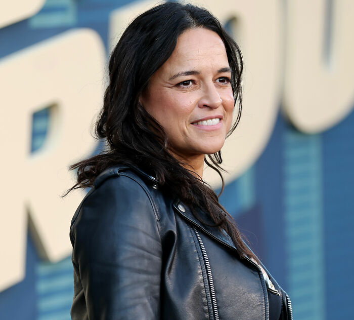 Michelle Rodriguez smiling, applauded for pointing out troubling pattern after Hayden Panettiere's passing.