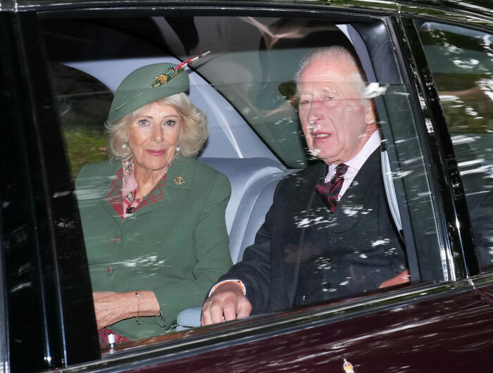 Camilla, Queen Consort and King Charles III are seated in a car, during Meghan Markle and Prince Harry's return to UK. Camilla, Queen Consort and King Charles III are seated in a car, during Meghan Markle and Prince Harry's return to UK.