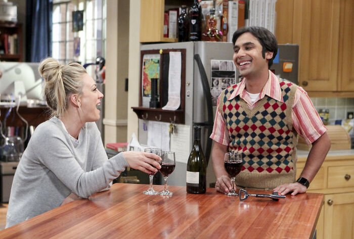 Kaley Cuoco and co-star share a laugh in a scene from The Big Bang Theory. Kaley Cuoco and co-star share a laugh in a scene from The Big Bang Theory.