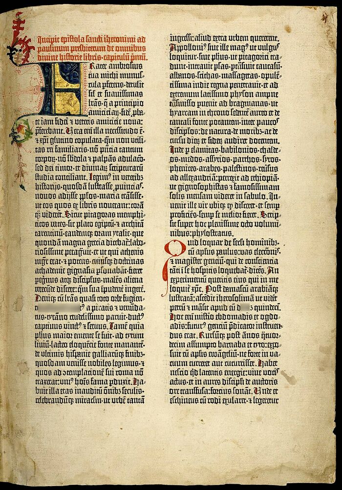 An ancient historical manuscript with intricate text and illuminated initial, one of many manuscripts and books sold for millions.