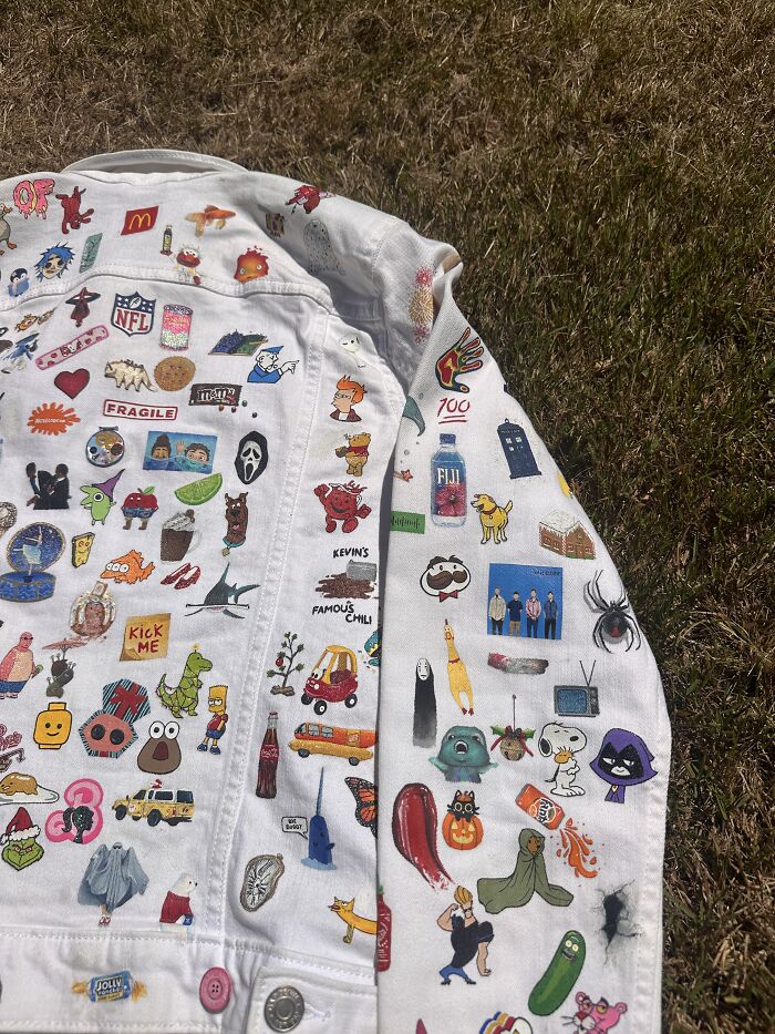A close-up of a jacket filled with pop culture references that shaped Gen-Z's childhood.