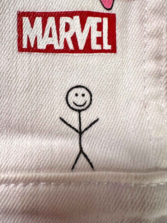 Artist created a custom jacket filled with pop culture characters like Marvel logo that shaped Gen-Z childhood.