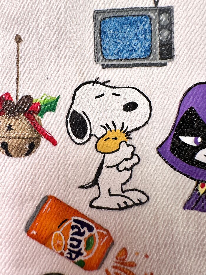 Artist created a custom jacket filled with pop culture characters like Snoopy and Raven that shaped Gen-Z childhood.