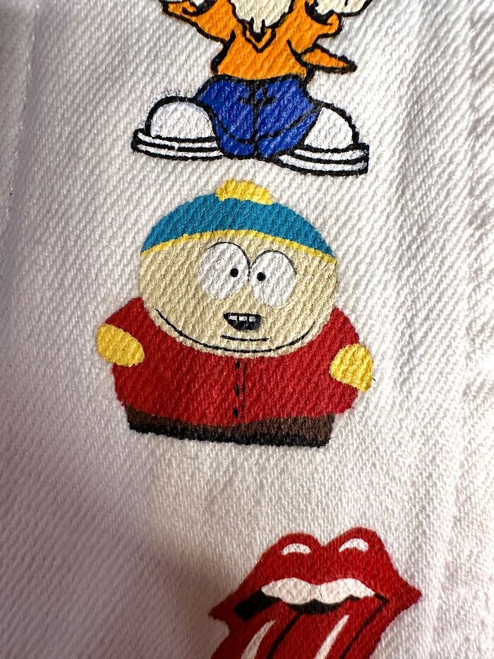 A close-up of Cartman from South Park embroidered on a pop culture jacket, capturing Gen-Z childhood nostalgia.