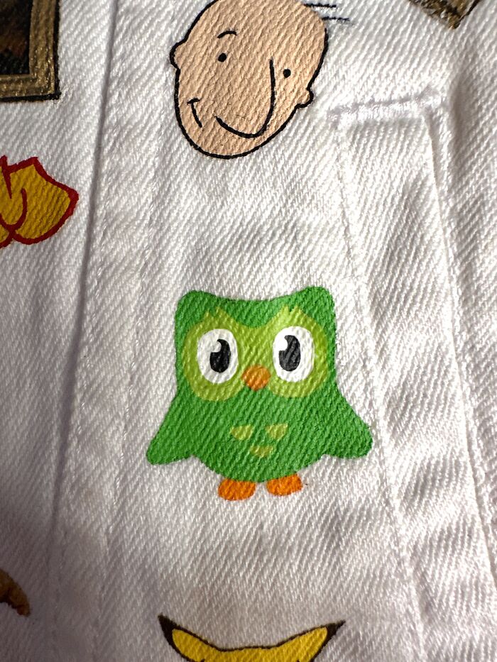 Duolingo owl detail on a pop culture jacket. This jacket shows pop culture that shaped Gen-Z's childhood.