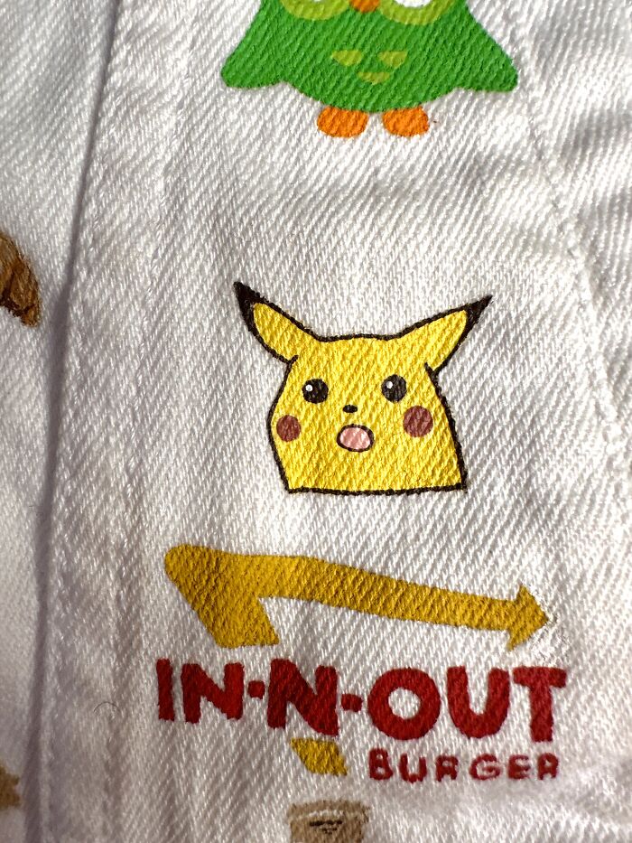 Pikachu and In-N-Out Burger logo, examples of pop culture that shaped Gen-Z's childhood, on a jacket.