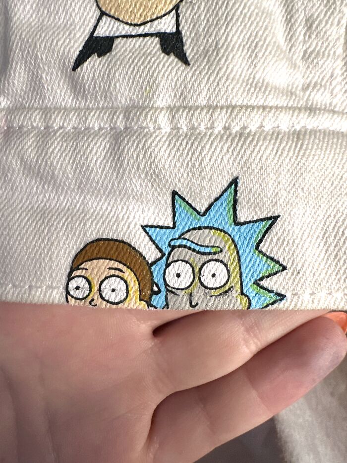Artist created a custom jacket filled with pop culture characters like Rick and Morty that shaped Gen-Z childhood.