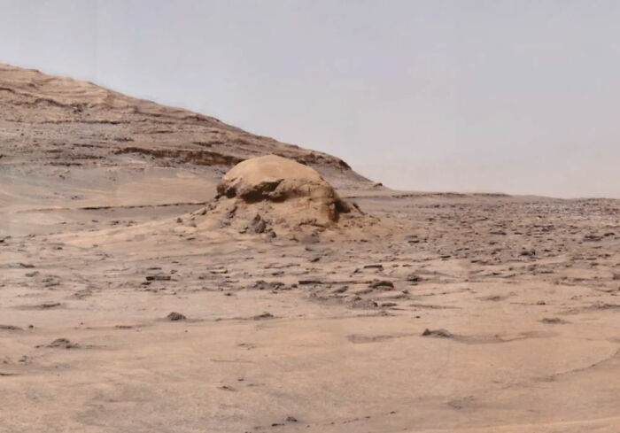 A wide shot of the Mars landscape, showing a large rock formation resembling a jellyfish, sparking frenzy about the NASA Mars photo. A wide shot of the Mars landscape, showing a large rock formation resembling a jellyfish, sparking frenzy about the NASA Mars photo.