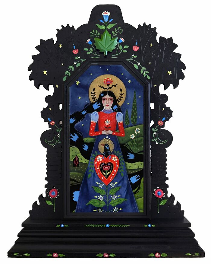 Folk-inspired artwork by Aunia Kahn, a woman with long hair and a heart motif, surrounded by traditional symbolism and imagination.