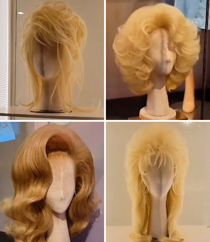 A collection of Dolly Parton's iconic wigs displayed on mannequins, highlighting her diverse hair styles. A collection of Dolly Parton's iconic wigs displayed on mannequins, highlighting her diverse hair styles.