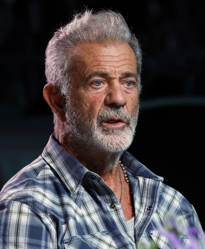 Close-up of Mel Gibson facing furious backlash for mocking deaf interpreter at Fan Expo. Close-up of Mel Gibson facing furious backlash for mocking deaf interpreter at Fan Expo.