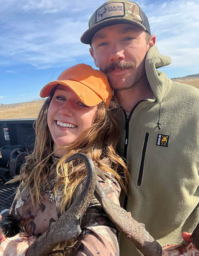 Couple in hunting gear, woman holding an animal horn, relating to the US tourist's court fate for a snatched baby wombat. Couple in hunting gear, woman holding an animal horn, relating to the US tourist's court fate for a snatched baby wombat.