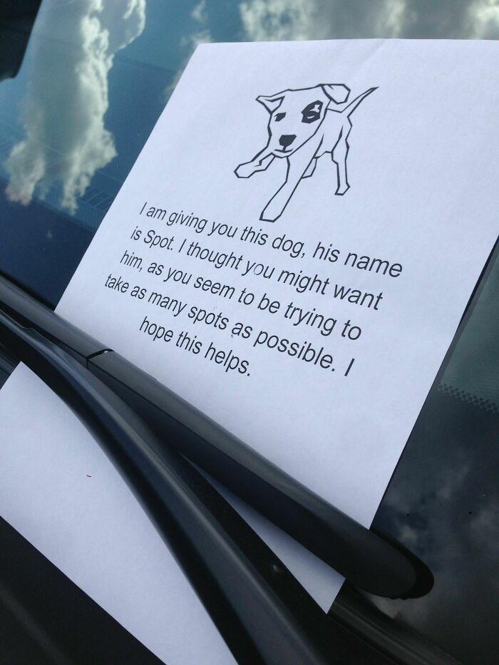 A note with a dog drawing, sarcastically giving the jerk neighbor a dog named Spot for taking many spots.