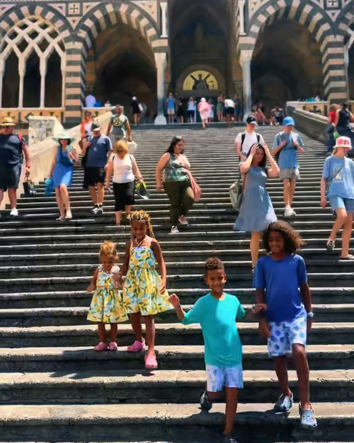 Kids reading and exercising on large outdoor steps, while netizens criticize mom for her parenting style. Kids reading and exercising on large outdoor steps, while netizens criticize mom for her parenting style.