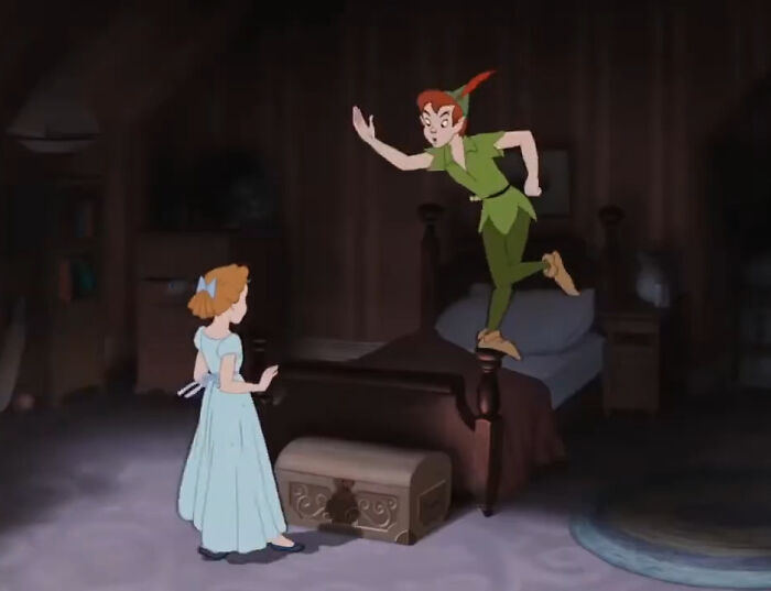 Animated Peter Pan stands on a bed while Wendy Darling watches him, symbolizing the whimsical nature of absurd American questions.