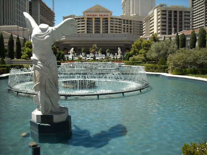 Absurd American questions: a fountain with a statue in front of Caesars Palace in Las Vegas.