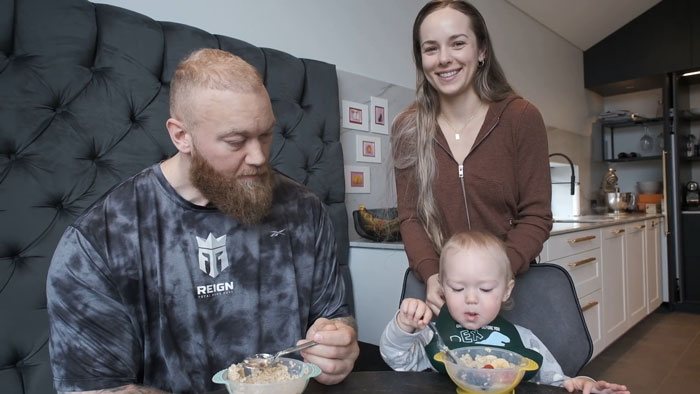 Game of Thrones The Mountain, his wife, and their baby eating together. Game of Thrones The Mountain, his wife, and their baby eating together.
