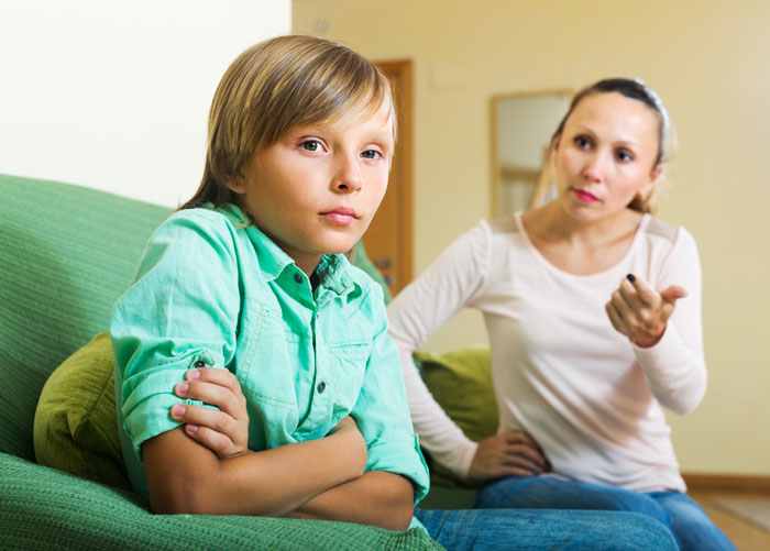 Annoyed child and an adult talking. Woman is adopted by stepmom, brother refuses to share inheritance. Annoyed child and an adult talking. Woman is adopted by stepmom, brother refuses to share inheritance.