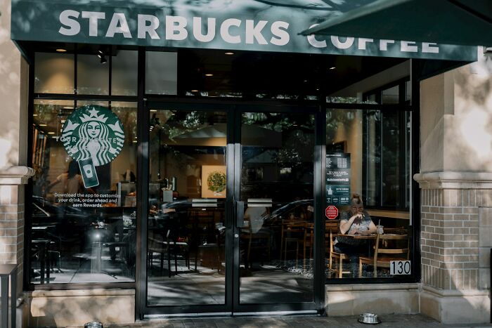 A Starbucks coffee shop, symbolizing a common social spot where college life freedom is enjoyed.