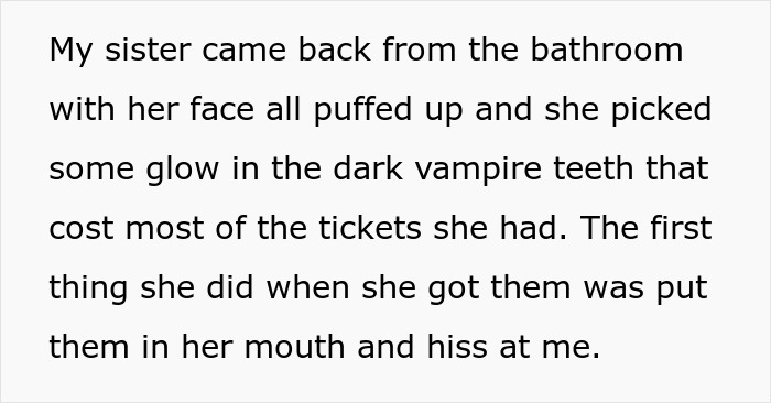 A spoiled sister with a puffed face, wearing glow-in-the-dark vampire teeth, hissing at her brother. A spoiled sister with a puffed face, wearing glow-in-the-dark vampire teeth, hissing at her brother.