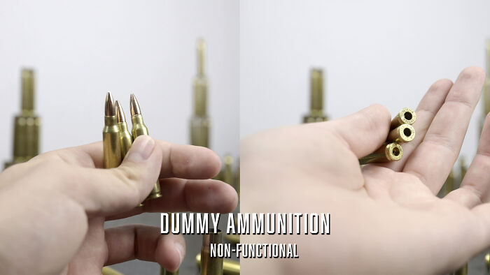 A hand holding dummy ammunition, showing how waste and industry are endangering animals. A hand holding dummy ammunition, showing how waste and industry are endangering animals.