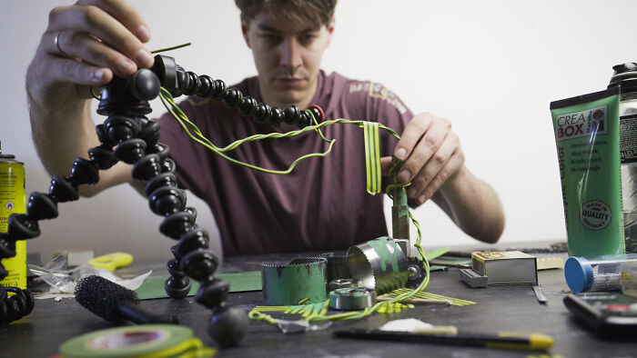 Photographer building miniature habitats for endangered animals to show how waste impacts wildlife. Photographer building miniature habitats for endangered animals to show how waste impacts wildlife.