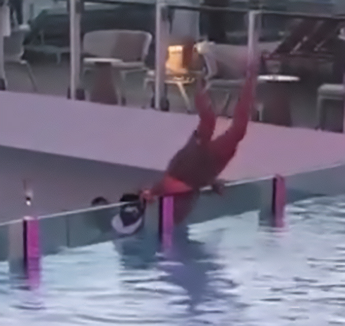 Terrified tourist falling into a pool on a cruise ship, one of many bizarre cruise ship incidents.