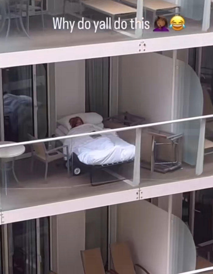 A person sleeping on a bed on a cruise ship balcony, relating to bizarre cruise ship incidents and the Foot Fungus Lady.