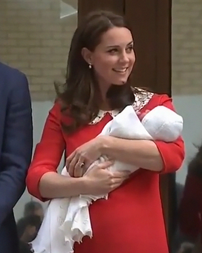 Kate Middleton, beaming, holds her newborn after a scandalous pregnancy and birth in the same hospital wing. Kate Middleton, beaming, holds her newborn after a scandalous pregnancy and birth in the same hospital wing.