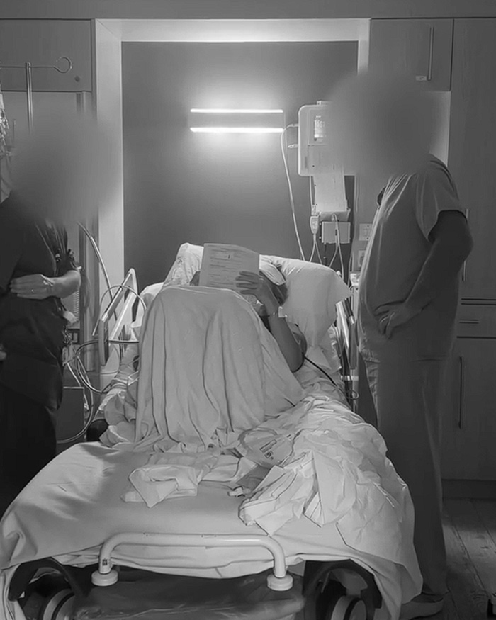 Bonnie Blue gives birth in the hospital wing after her scandalous pregnancy, with medical staff present. Bonnie Blue gives birth in the hospital wing after her scandalous pregnancy, with medical staff present.