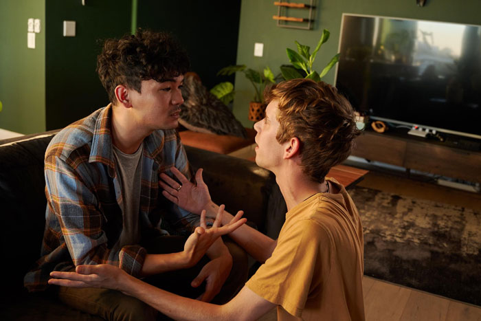 Two men arguing, highlighting the unraveling relationship and potential dark secrets of the BF. Two men arguing, highlighting the unraveling relationship and potential dark secrets of the BF.