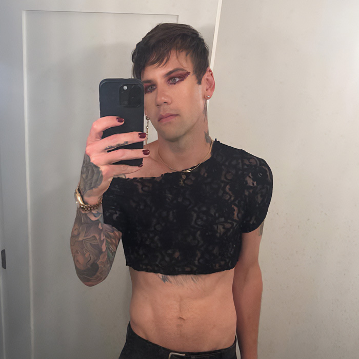 Rock star emerging unrecognizable, showing his new look after coming out as gay