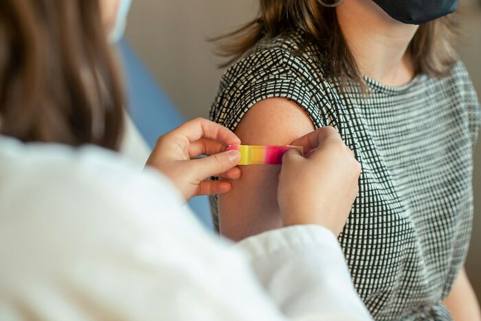 A person receiving a vaccine shot, a common scary science fact for some.